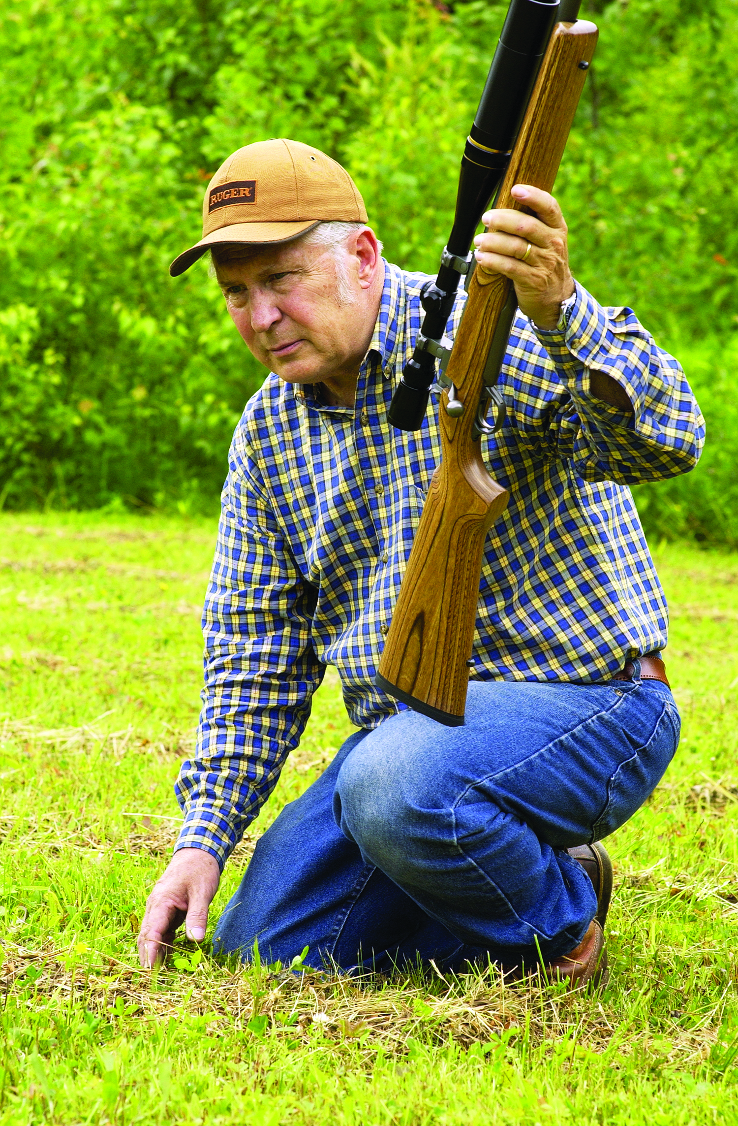When you have a period of time when you know the chucks are not around in the heat of the day, checking out their dens and favorite trails back to the tree line will produce good results later.